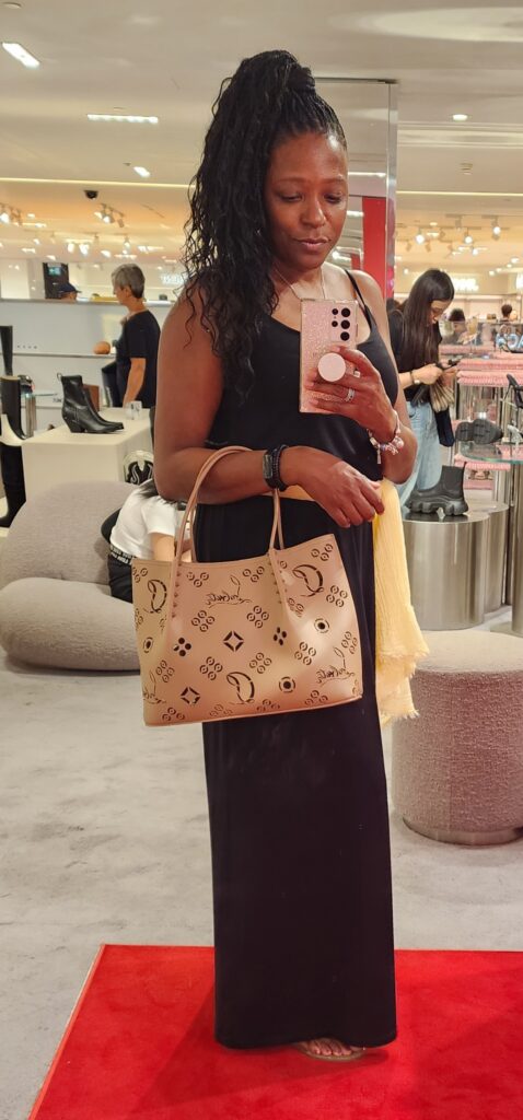 Me trying on a bag to pick a size.